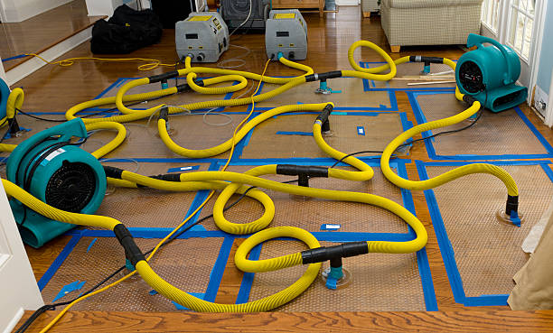 Professional Flood Damage Restoration technician working in Conconully, WA